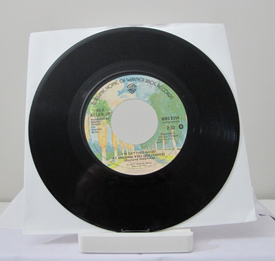 45 RECORD - REX ALLEN JR -  I'M  GETTING GOOD AT MISSING YOU