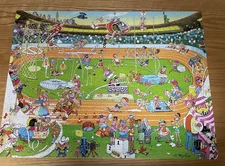 2011 CEACO 750 PIECE JIGSAW PUZZLE COMIC RELIEF SOULAGEMENT COMIQUE "OLYMPICS"