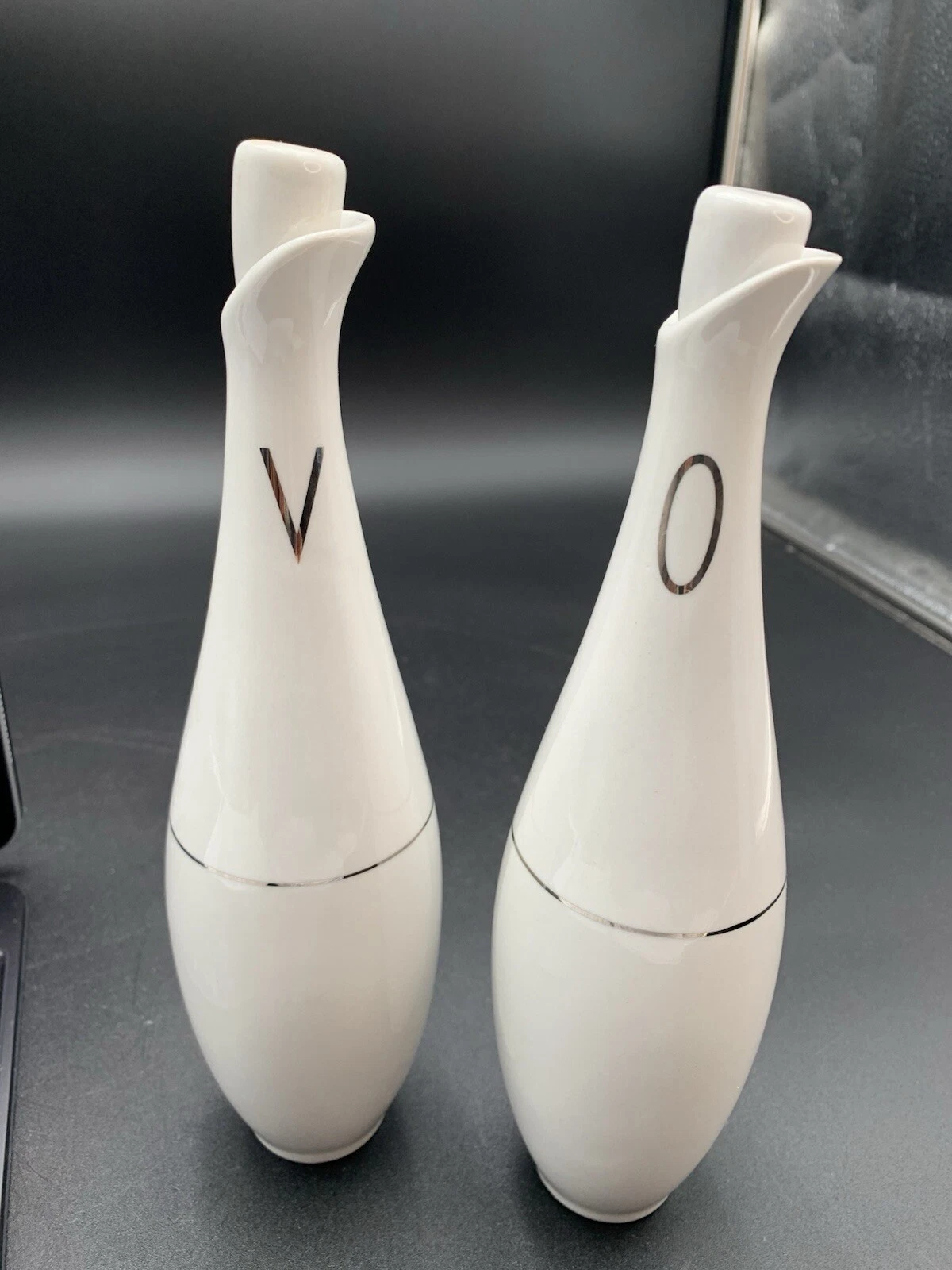 VTG INTERNATIONAL SILVER OIL AND VINEGAR BOTTLES 7 1/2“T X 2 3/4“W