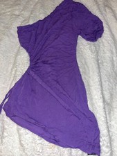 Dark purple asymmetrical dress with cut out cinch