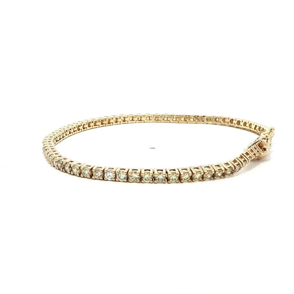 Brazalete de tenis de línea clásica de diamantes brillantes ardientes de 2,92 quilates de oro amarillo de 14 k Foto 4 de 4