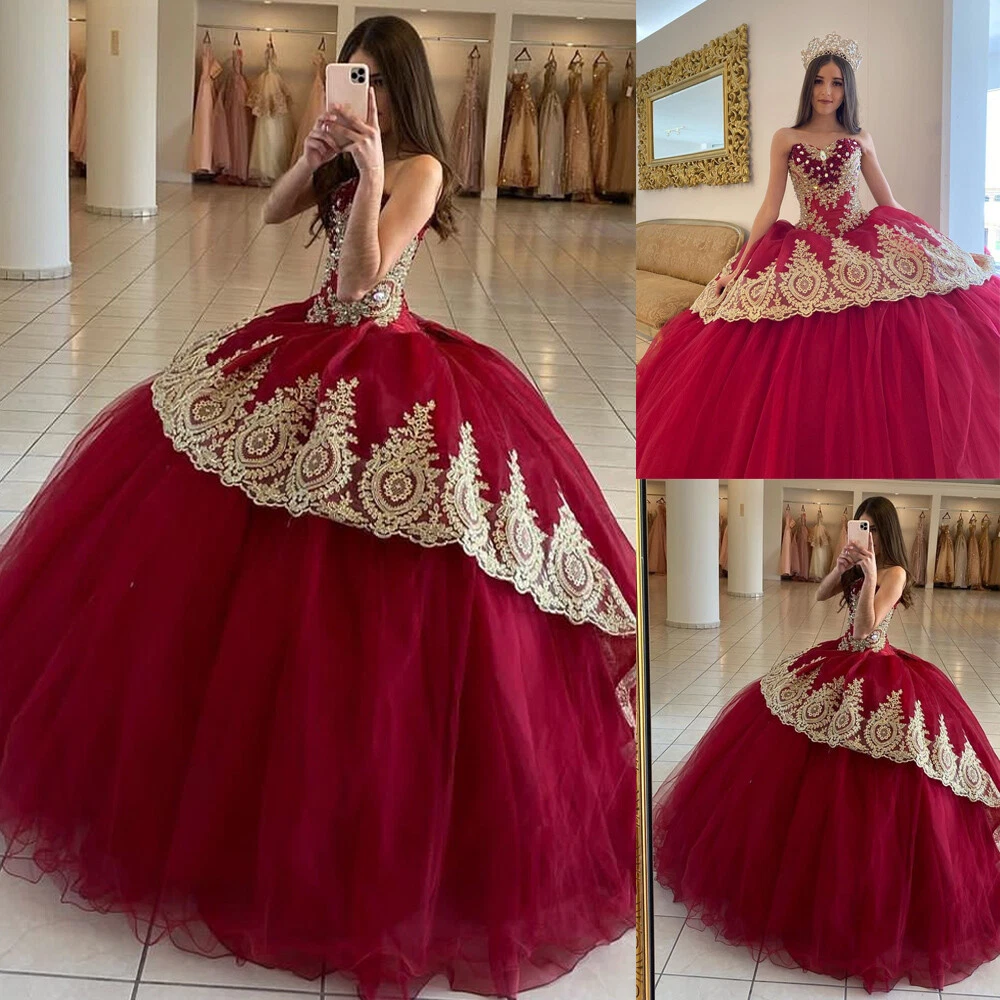 Maroon dress top with gold accessories