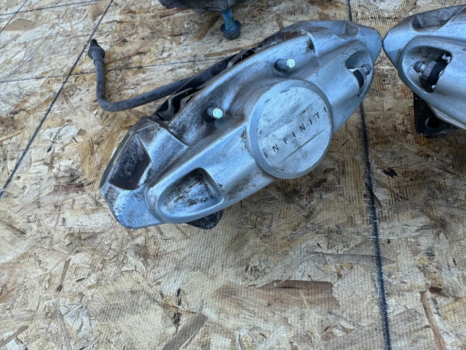 INFINITI NISSAN 2007-2024 OEM CONJUNTO DE PINZAS DE FRENO DELANTERAS TRASERAS IZQUIERDA DERECHA AKEBONO Foto 2 de 4