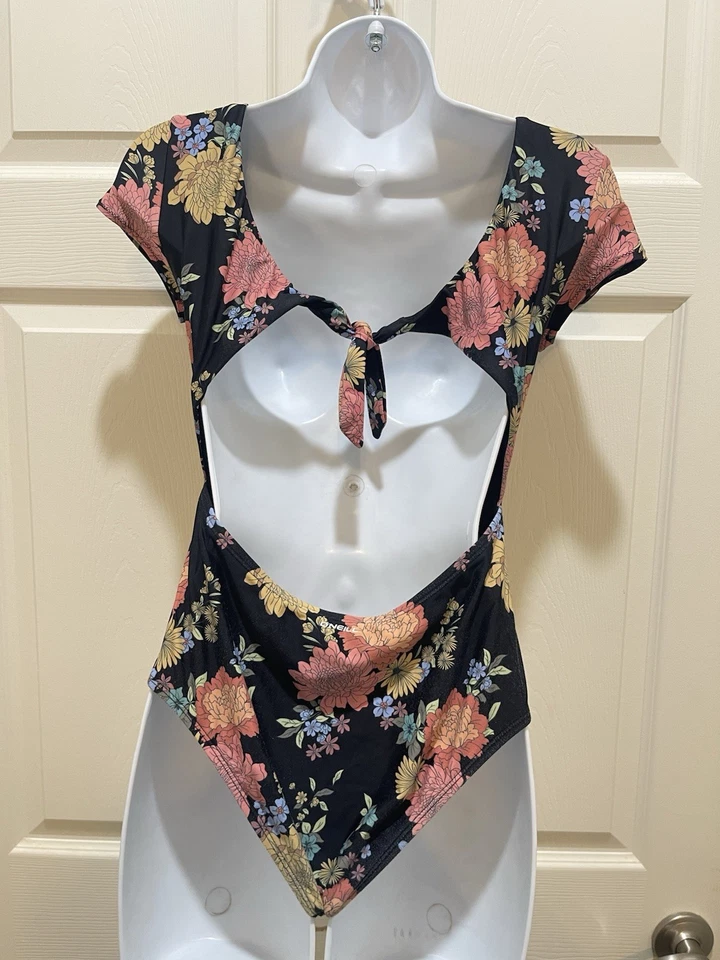 Traje de baño O’Neill de una pieza negro floral atado trasero talla 16 para niñas Foto 4 de 4