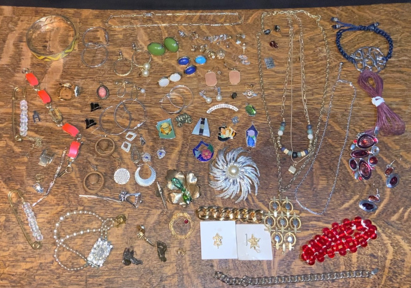 100+ pieces. Vintage and modern costume jewelry. Earring sets, necklaces, pins….