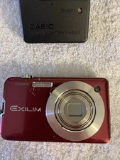 Casio Exilim EX-S10 10 Mega Pixel Digital Camera With Charger And Battery. Works