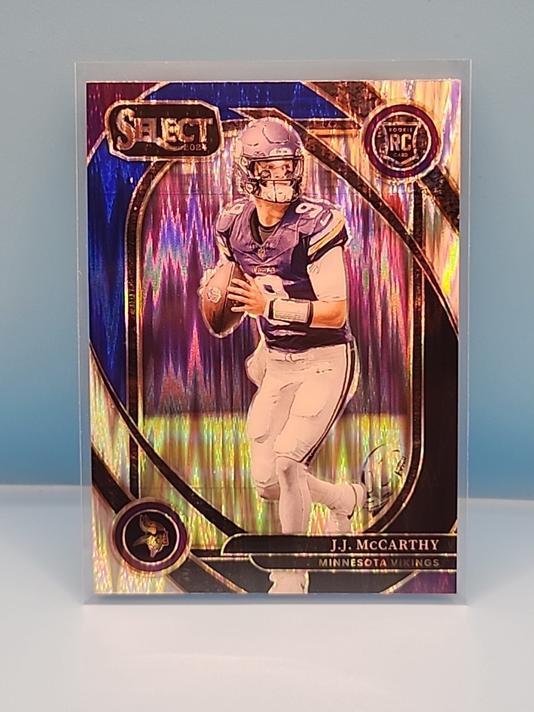 2024 Panini Select - Club Level J.J. McCarthy #246 Black & Blue Shock Prizm (RC)