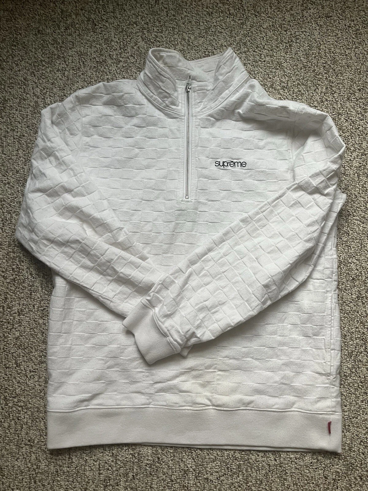 Pull demi fermeture éclair à carreaux à chevrons Supreme SS15   Blanc