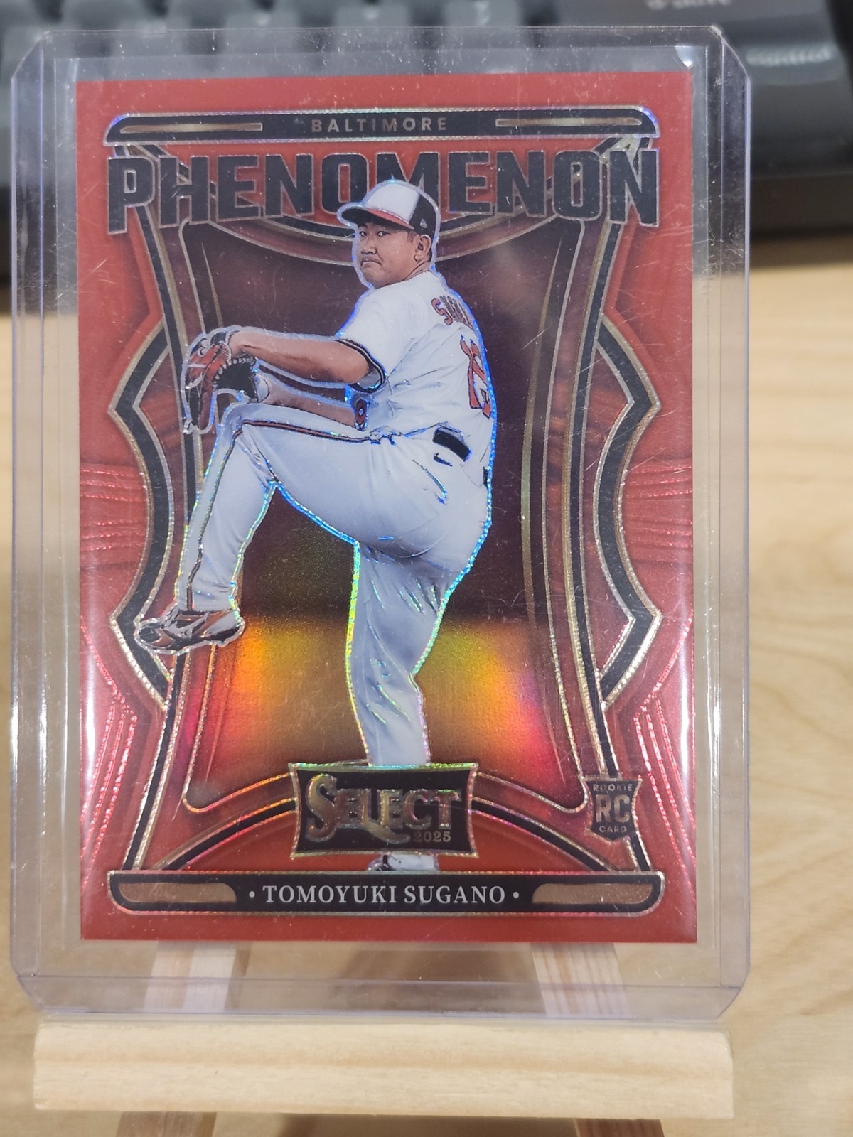 2025 Select Phenomenom Tomoyuki Sugano RC #22 Red Prizm #'d /99 Orioles