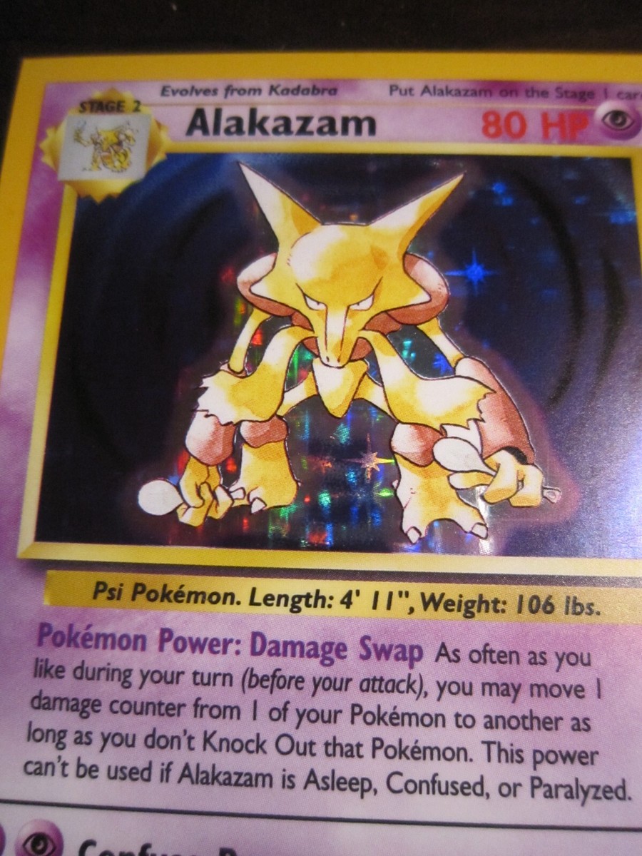 AUTHENTIC 2000 Alakazam SQUARE CUT Corner SWIRL Holo Pokemon card