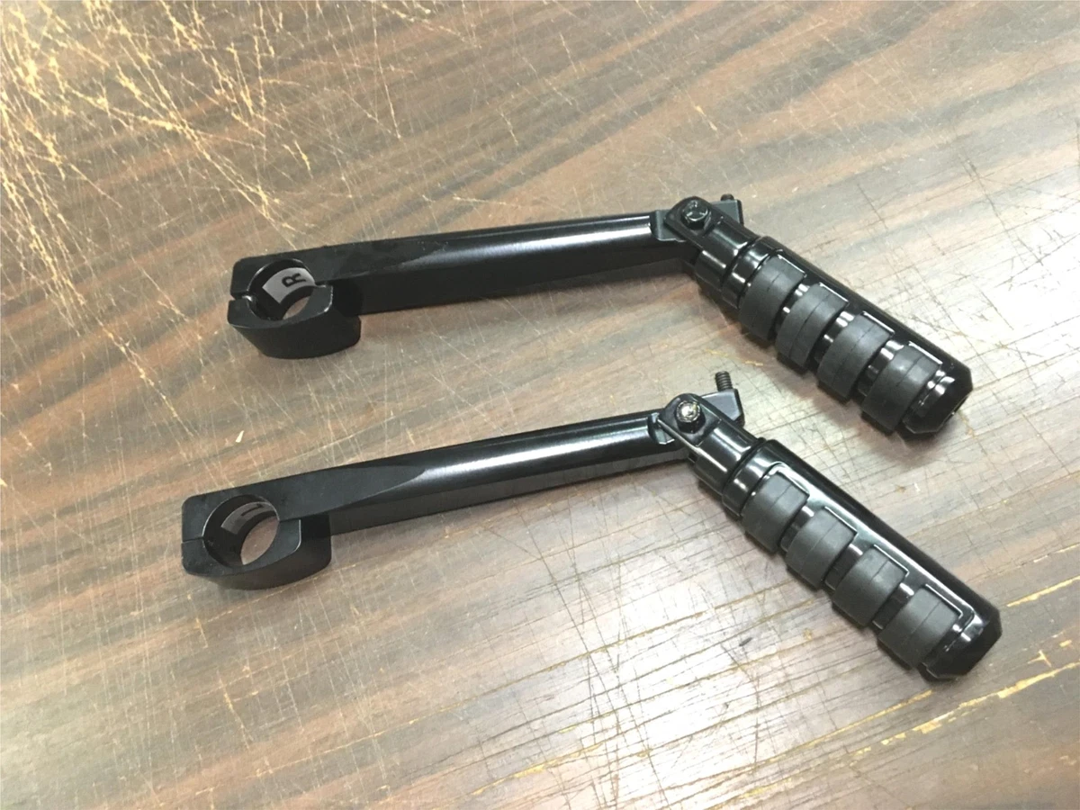 Frame mounted highway top pegs for harley davidson