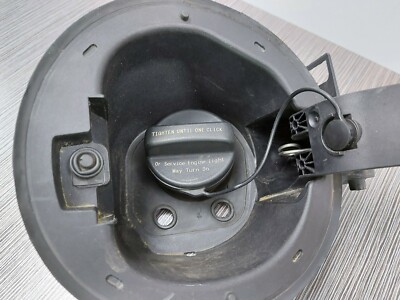 Tighten gas cap cadillac