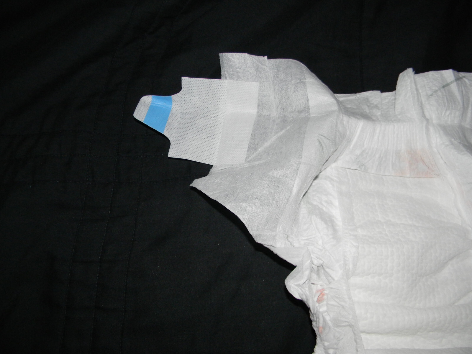 4 sample kuxiaoquan baby diapers size 6 XL will fit 32 in waist.