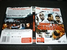 CAUGHT IN THE CROSSFIRE (DVD, MA15+) (162169 A)