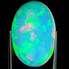 9.21 Ct IGI Certified Natural Ethiopian Cabochon Opal Multi Color Oval Cut — photo 5