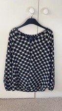 Smart black white tunic top 12 designer Jeff Gallano