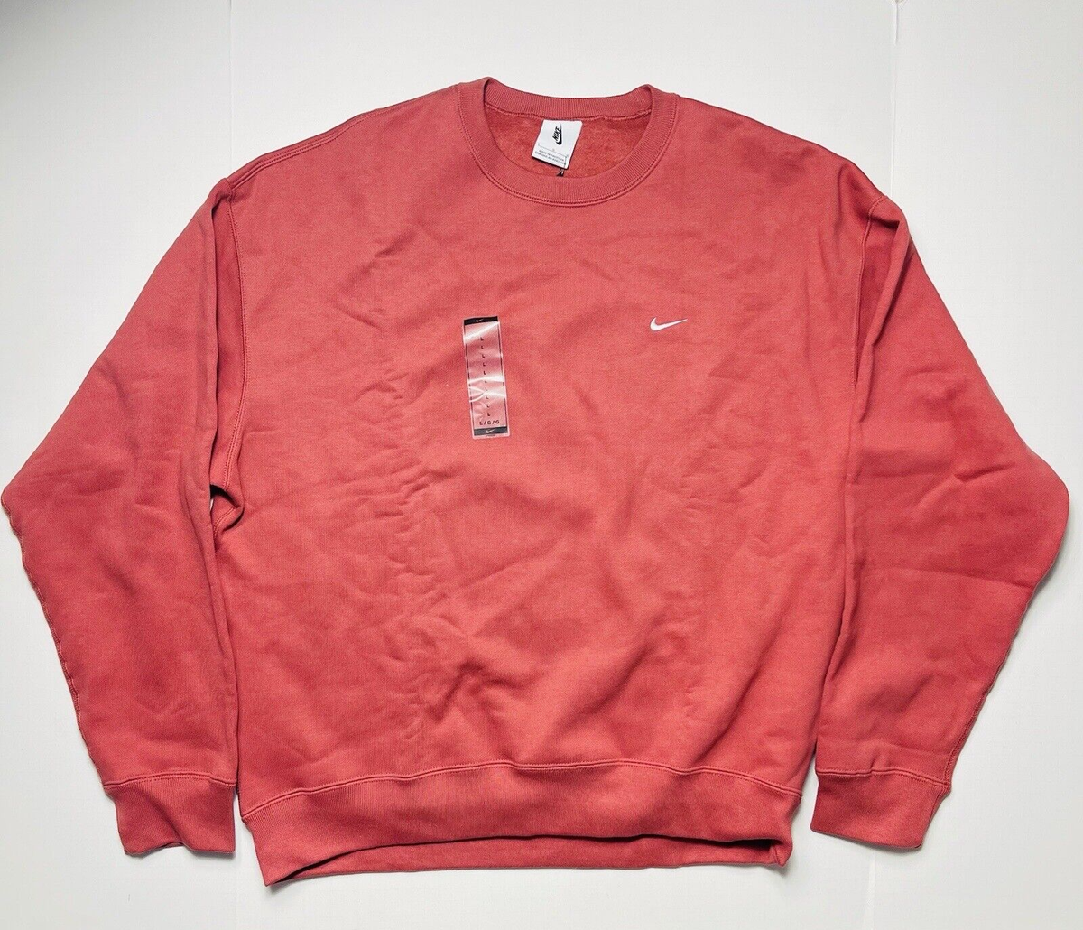 rust color nike sweatshirt