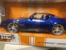 JADA TOYS 1977 PONTIAC FIREBIRD TRANS AM METALLIC BLUE /w Upgraded  Rims