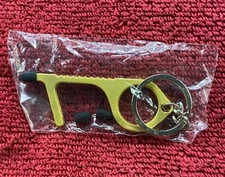 No Touch Safety Keychain Door Opener-new in sealed package Gold Color B3