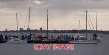 PHOTO  PIER AT WICOR THE PIER OF WICOR MARINE IS FULL OF LITTLE YACHT TENDERS BE