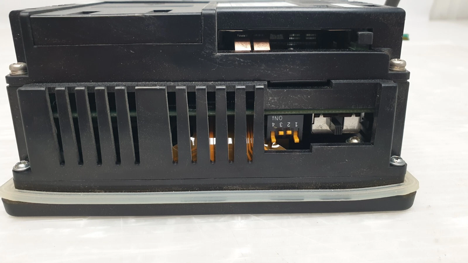 Side of the Fuji UG230H-LS4 housing with DIP switch and connectors