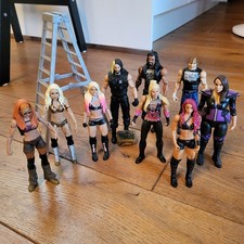WWE Actionfiguren Sammlung 9 Stück + Zubehö...