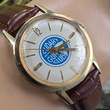 Reloj de cuerda manual vintage Bulova Caravelle para hombre esfera Cudahy Gun Club 1973