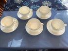 Wedgwood Embossed Queensware Cups And Saucers Set Of 5