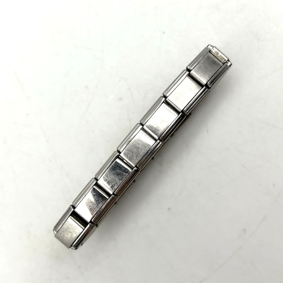 Pulsera italiana elástica vintage años 00 D'linQ 17 eslabones 7 dijes millennial Foto 4 de 4