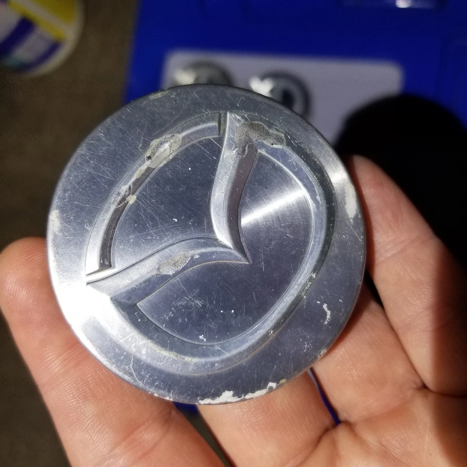 Lote de 7 Tapacubos Mazda 626 Protege Millenia Tapacubos Mecanizados 2.25" Fabricante de Equipo Original Foto 4 de 4