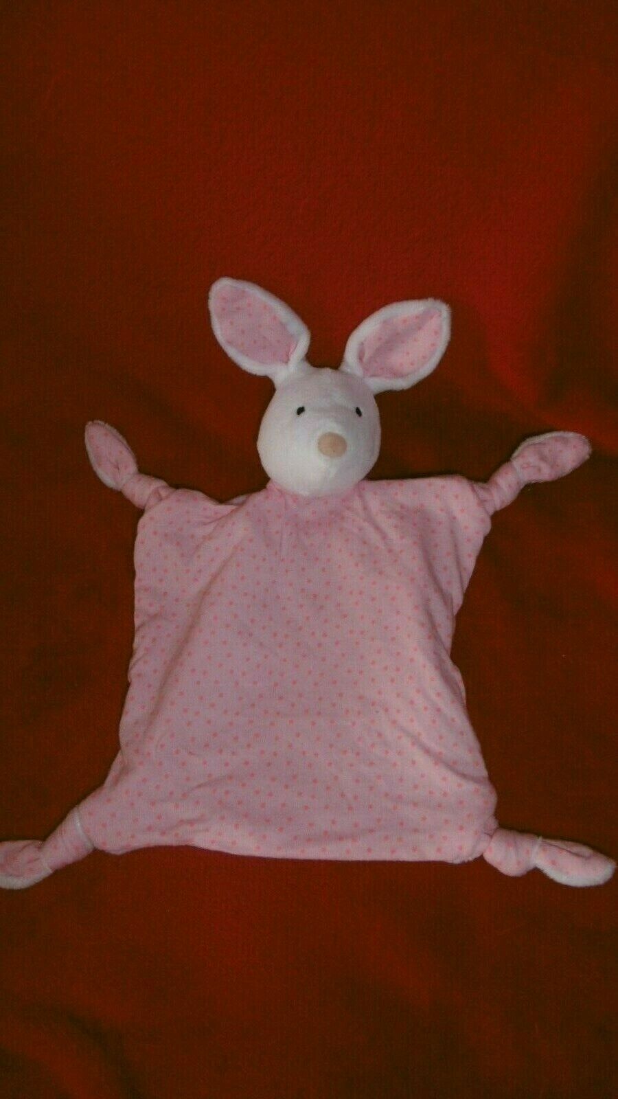 Doudou plat lapin blanc et rose fluo aux finitions soignées pour bébé de 0 à 12 mois