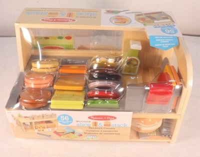 Melissa & Doug Wooden Slice & Stack Sandwich Counter with Deli Slicer 56-Pieces