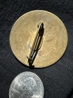 Badge — photo 4