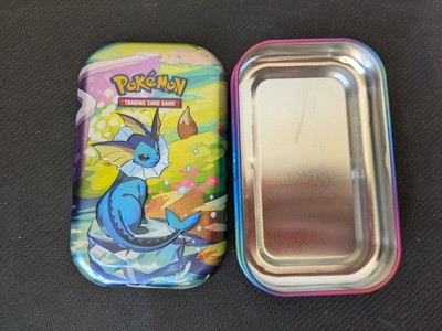 Pokémon Prismatic Evolutions - Vaporeon Mini Tin - LEER