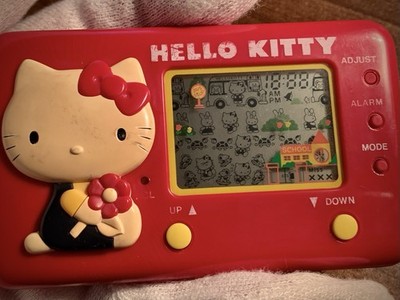 Tomy Electronic LCD Game & Watch 1983 Sanrio Hello Kitty School Bus (B)