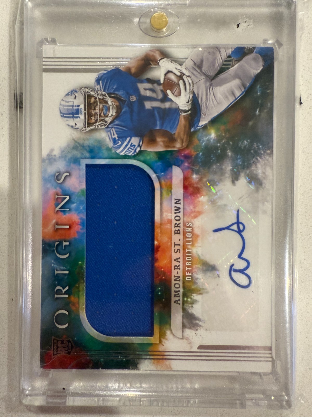 2021 Panini Origins Rookie Jumbo Patch Autograph Amon-Ra St. Brown #183 (RPA)