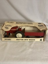 Vintage ERTL International Harvester Toy Tractor With Red Wagon 1709 USA Made
