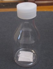 NICOLE 2005 Clear Plastic Round Bottle w/White Screw Top cap 4 " Approx. 1 cup