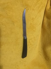 Vintage Quikut Steak Knife Brown Faux Wood Handle Serrated Made In USA