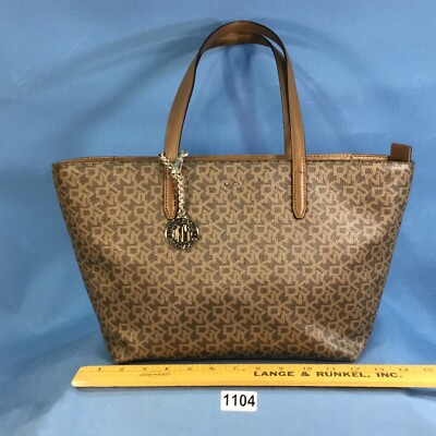 DKNY Purse Bryant Med. Signature Print Brown/Beige Zippered Tote with pockets.