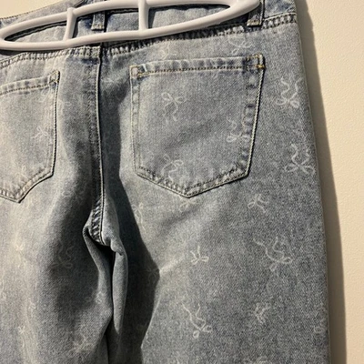 RSQ Kids Girls Light Wash Bow Print Straight Leg Denim Jeans Size 14 Acid Wash - Image 1 of 4