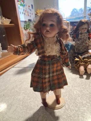 Vintage Porcelain  Wood And Rubber Doll - Image 1 of 3