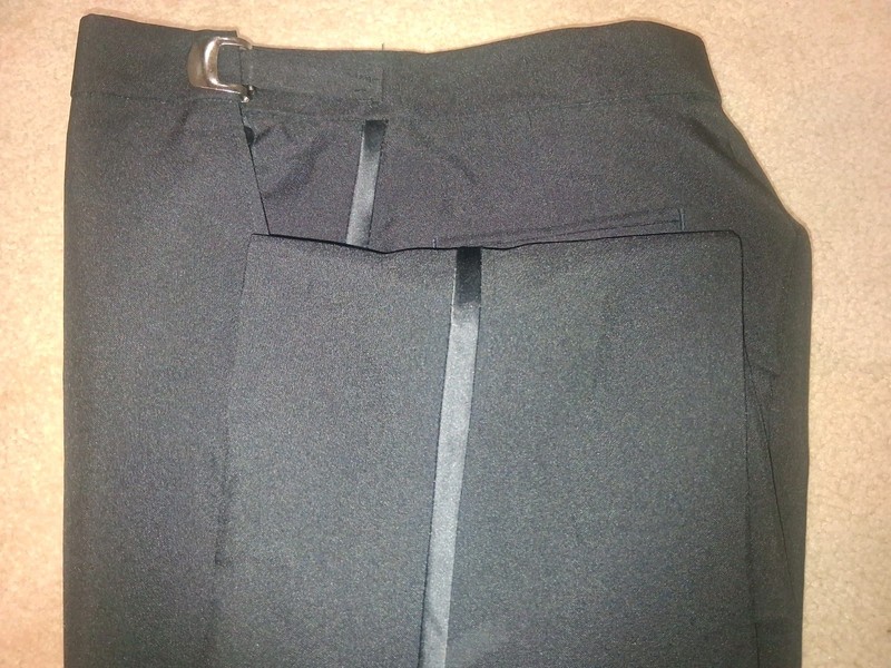 Tuxedo pants size 26 waist expandable with a 28  Inseam By Cousins...