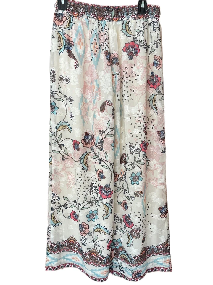 Pantalones Reba para mujer blancos con superposición floral talla mediana  Foto 2 de 4