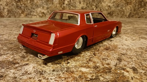 1986 Chevrolet Monte Carlo SS Candy Red 1/24 Diecast Model Car by