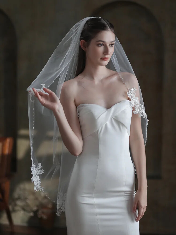 plain wedding dress with lace veil Quick! Which veil are you wearing with this satin, fit and flare wedding dress? , 1. Cathedral length veil with lace trim, 2. Classic, plain edge veil, 3. Full lace veil, Let us know in the comments
