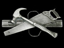 UC11121 VINTAGE 1981 HAMMER, SAW, LEVEL TOOLS COMMEMORATIVE BELT BUCKLE