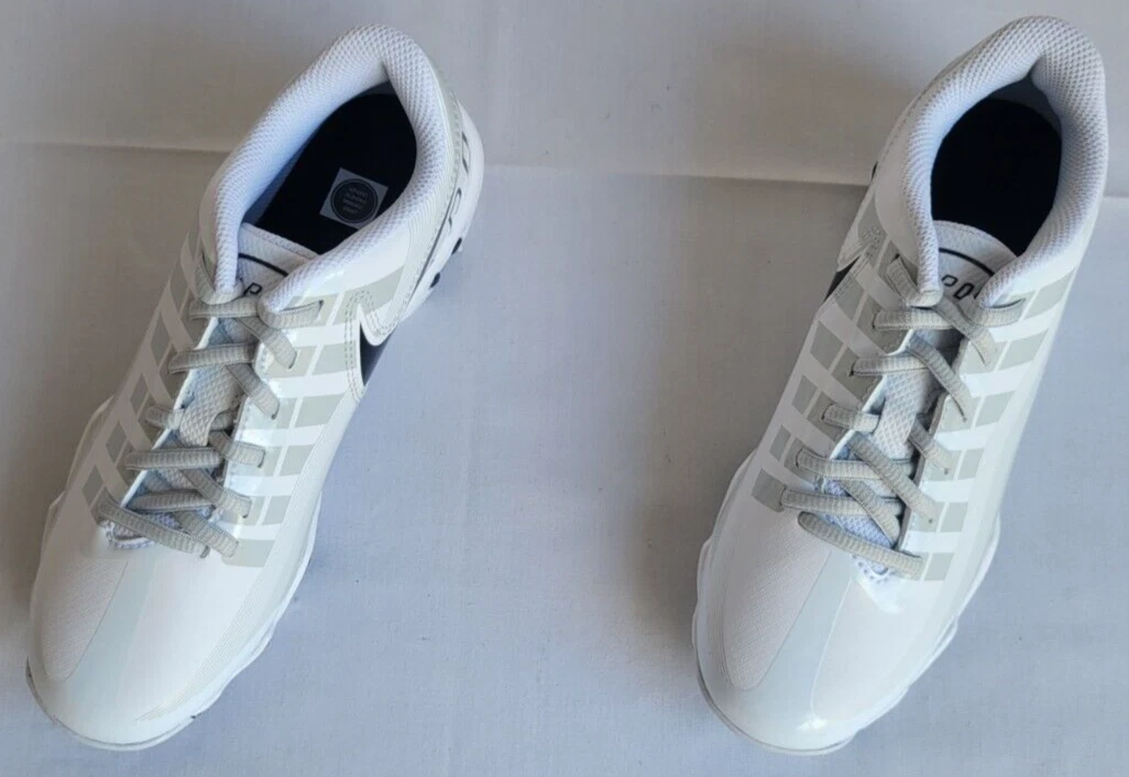 Grey youth deals football cleats