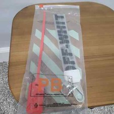 Unisex keyring in OFF-WHITE plastic. Length about 26 cm. Year 2013.