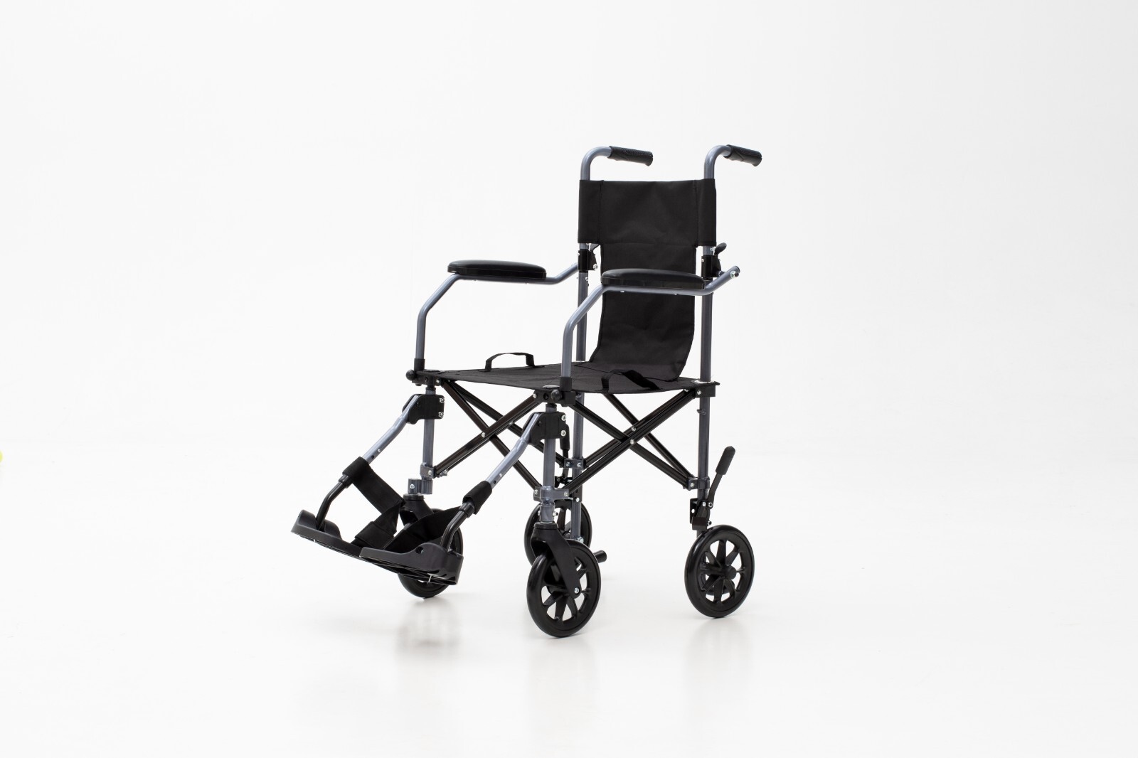 New HECARE Ultra Lightweight Folding traveLite transit wheelchair in a